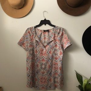 Multicolored patterned front tie blouse